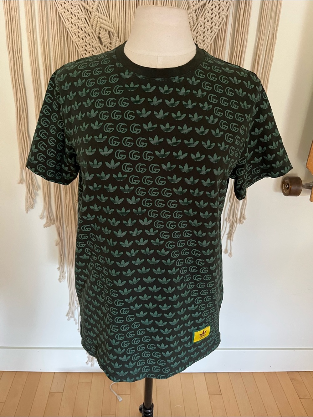 Black Short-Sleeve Tee with Green Allover Trefoil Pattern